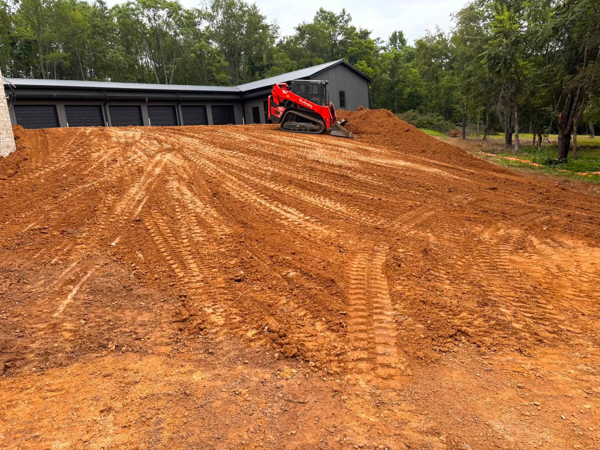 Compact track loader grading commercial construction site in Lebanon, TN Compact track loader grading commercial construction site in Lebanon, TN